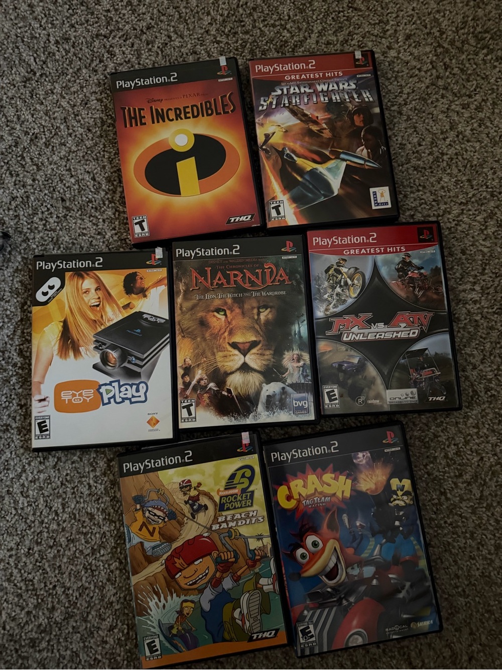 Sony PlayStation 2 Game Bundle - Black Cases with Colorful Covers